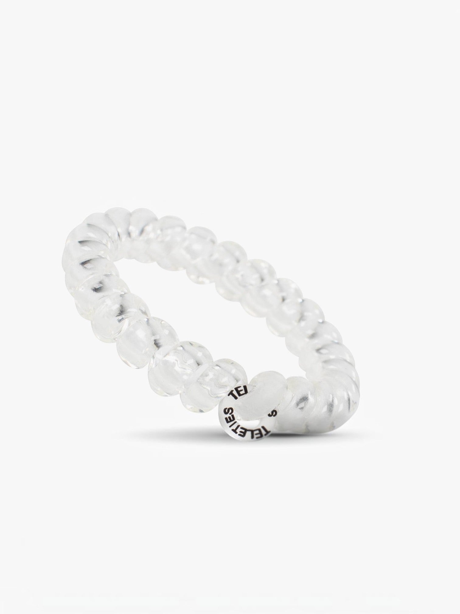 Mialur TELETIES large crystal clear spiral hair tie with a strong grip design, worn as a stylish bracelet.