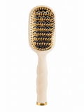Mialur TELETIES tan vented hair brush with aluminum plate, coil-inspired handle, and gold cleaning pick.