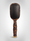 Mialur TELETIES detangler hair brush for fine hair in a tortoise pattern with a coil-inspired grip.