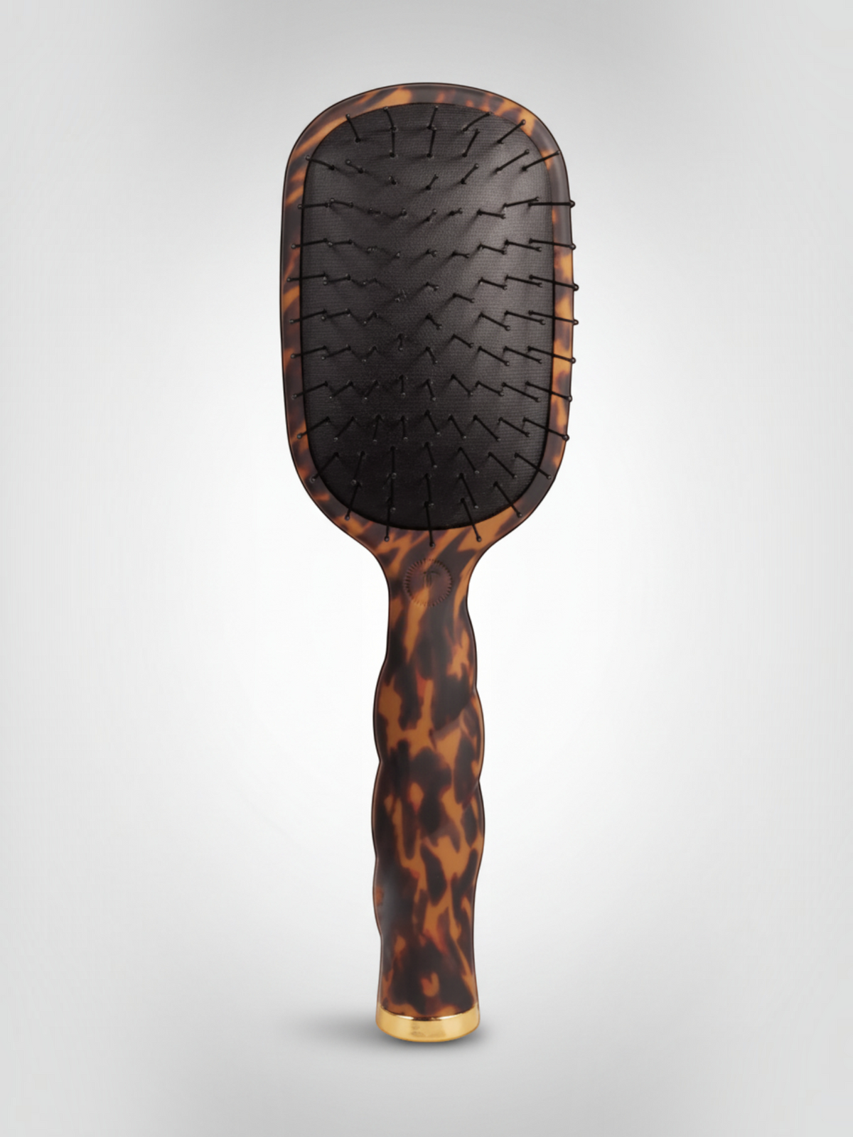 Mialur TELETIES detangler hair brush for fine hair in a tortoise pattern with a coil-inspired grip.