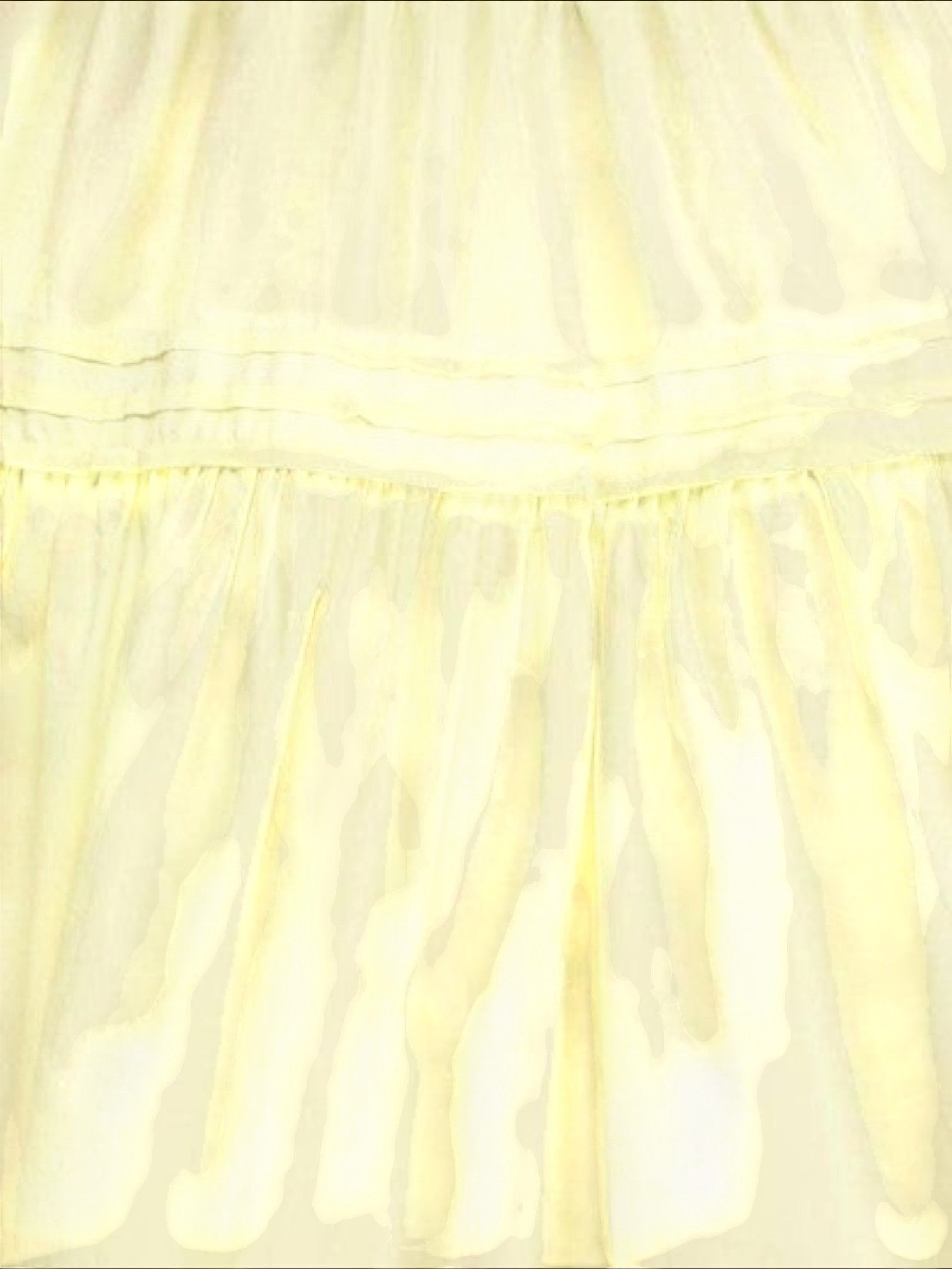 Mialur Valencia dress in butter yellow featuring a tiered skirt design with soft fabric folds.