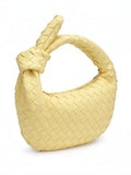 Mialur Verona bag in butter yellow vegan leather with a woven texture and a distinctive knotted handle.
